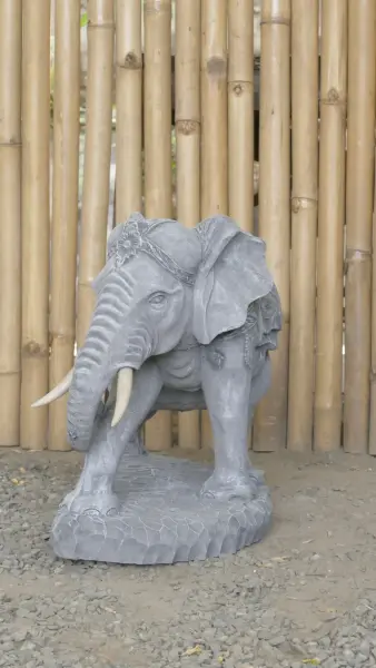 Product image 6 of the product “Nandi - Small Elephant bending to the right, 45cm L | cast stone ”